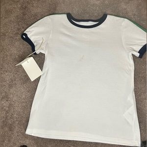 Boys Authentic Gucci shirt. Gently worn. Size8. Small Stain as shown in last pic